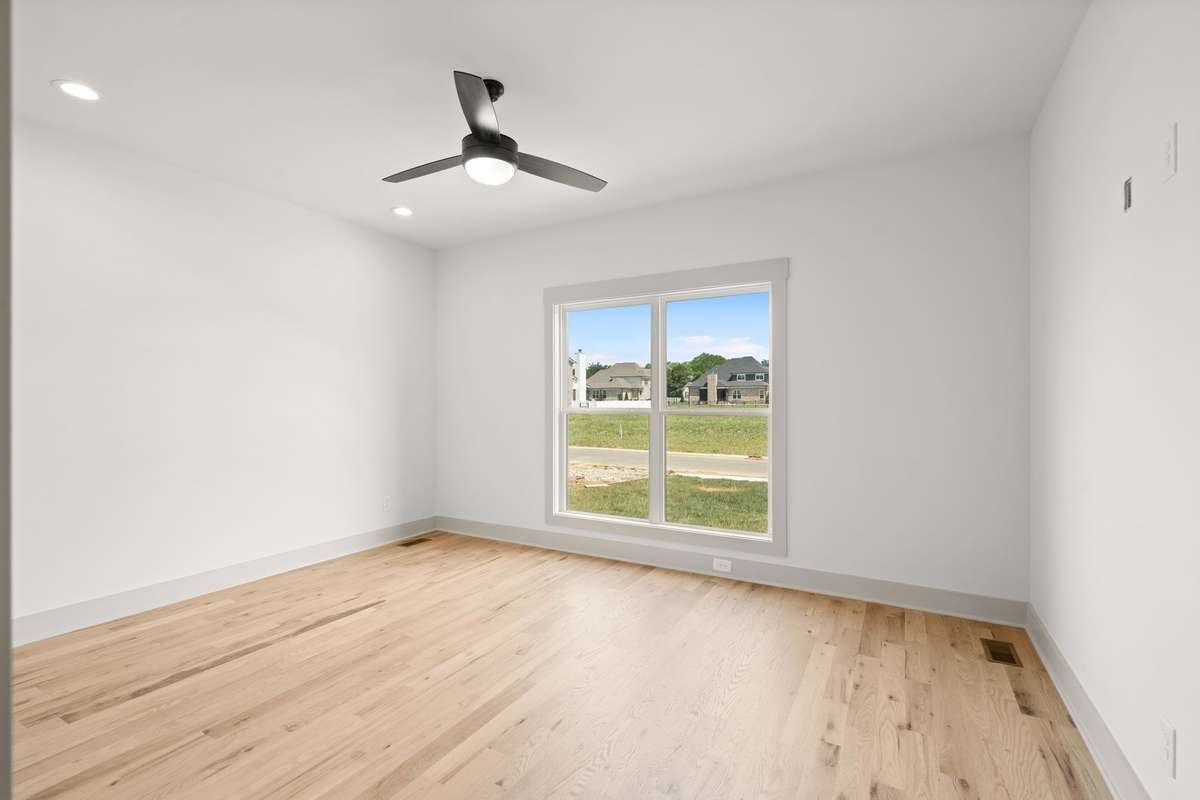 Guest bedroom or office down with a hall bath and large closet.