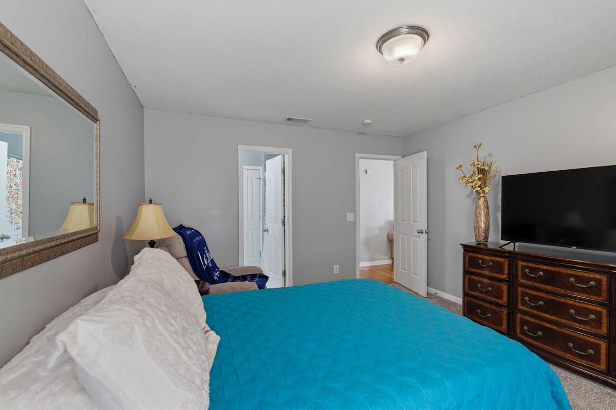 Bedroom #1 - Primary Bedroom with attached full bathroom suite!