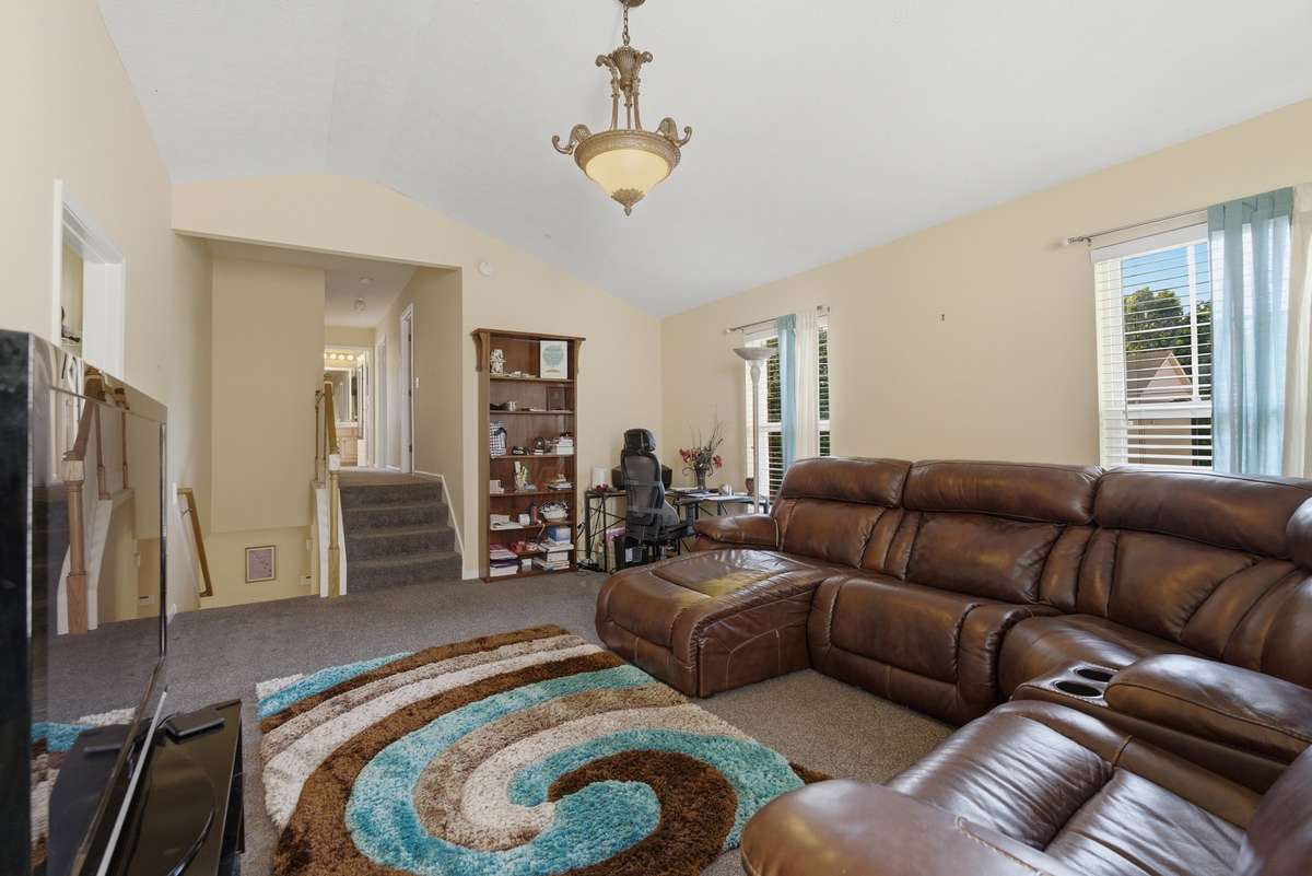 Spacious Mid-Level Bonus area/office with storage galore.