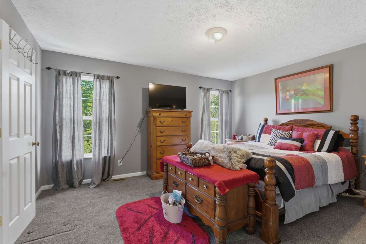 Well lit owner's suite with closet space galore