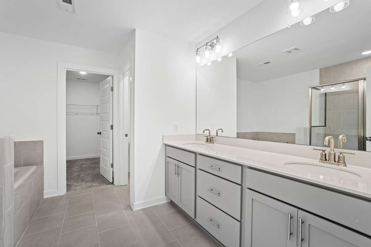 Picture of model home and not of actual home being built.  Colors and selections may vary