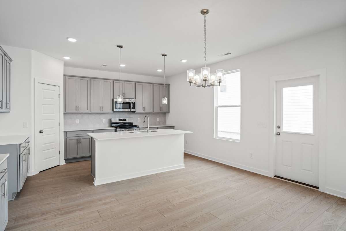 Picture of model home and not of actual home being built.  Colors and selections may vary