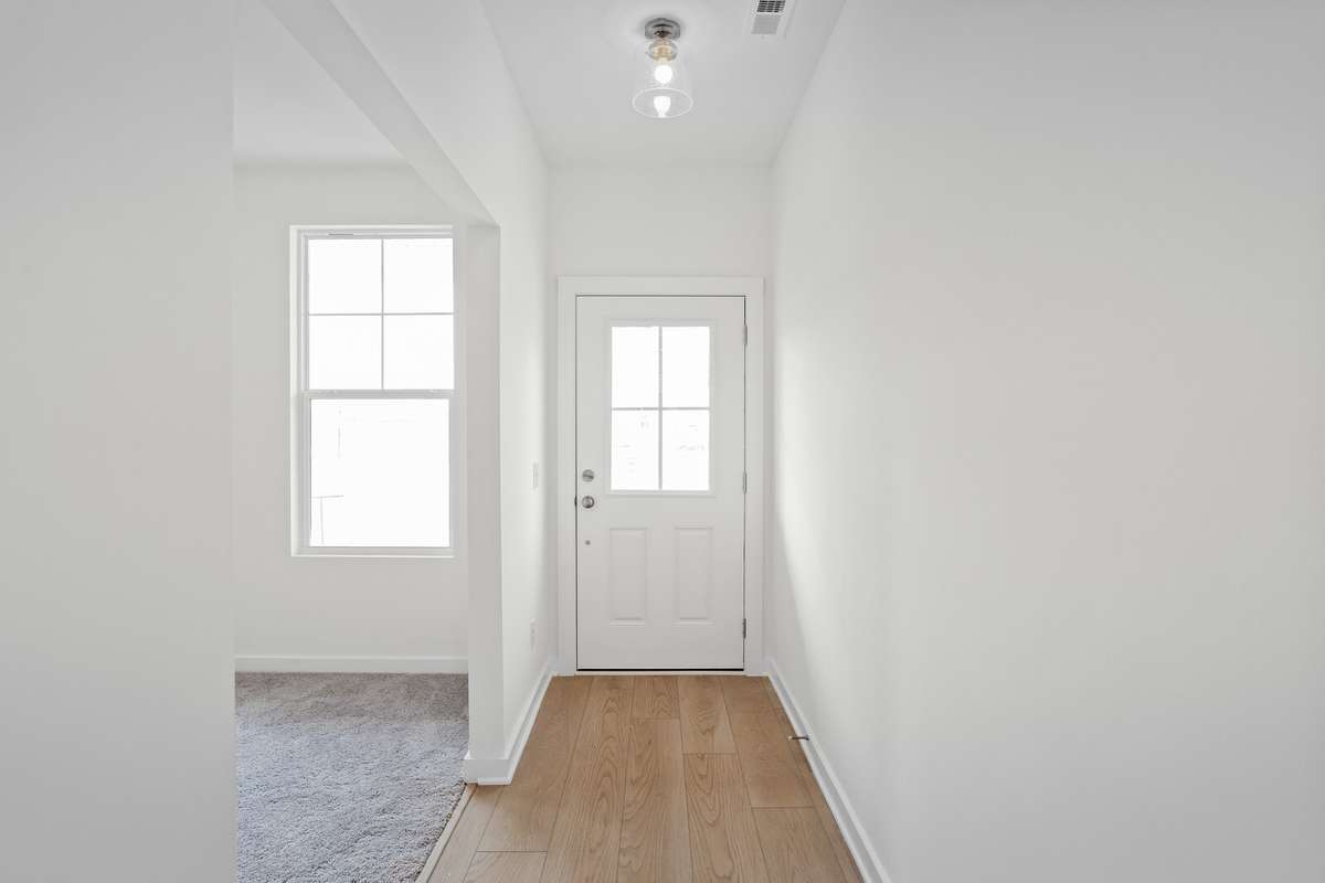 Picture of model home and not of actual home being built.  Colors and selections may vary
