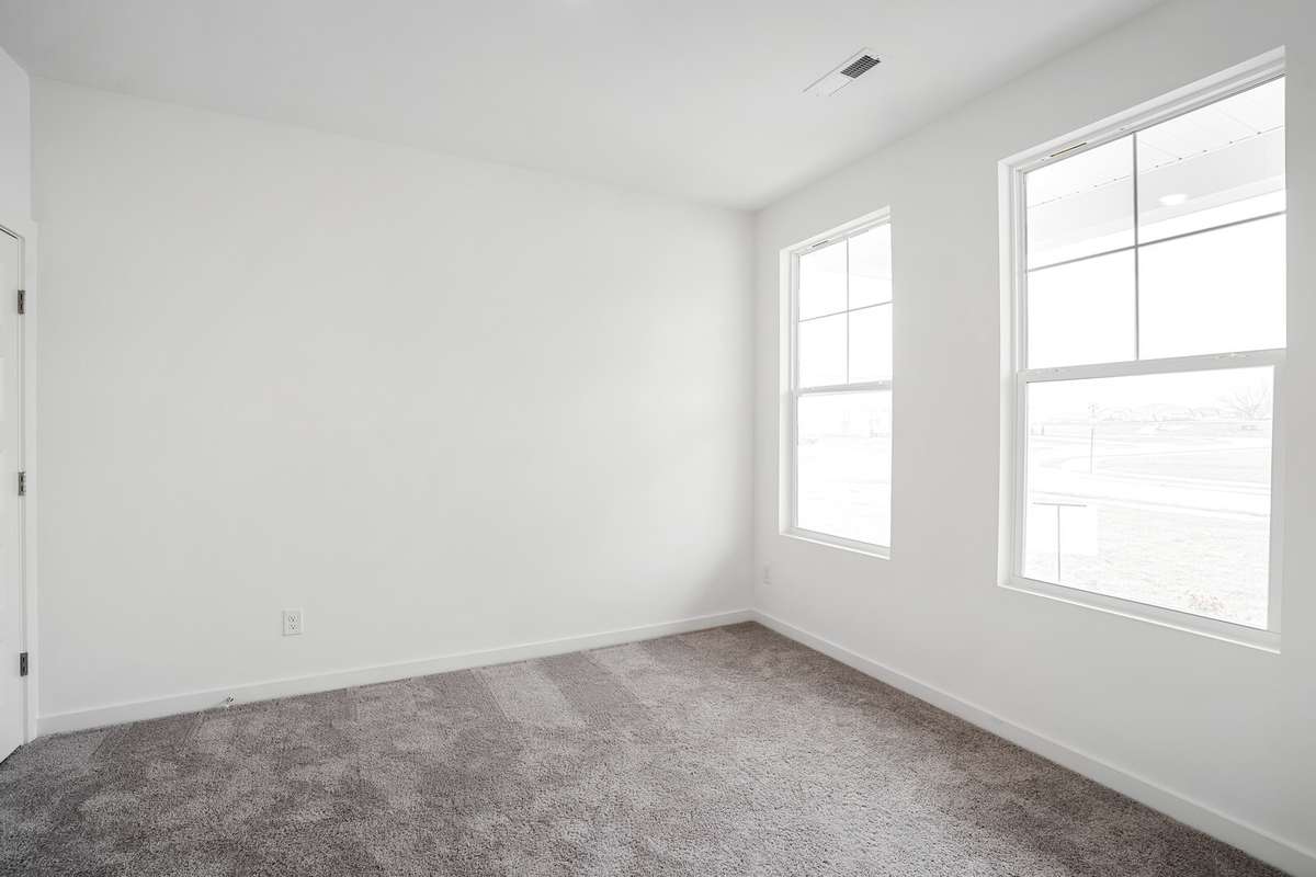Picture of model home and not of actual home being built.  Colors and selections may vary