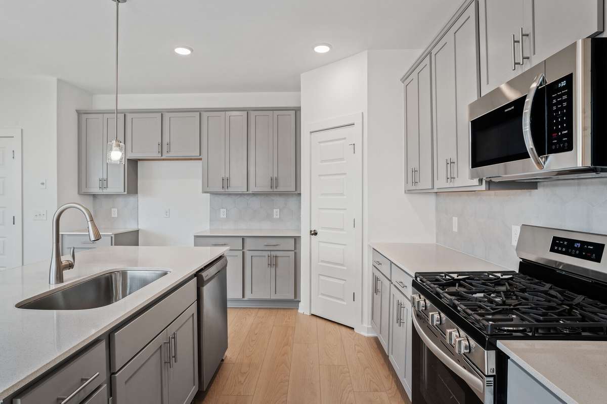 Picture of model home and not of actual home being built.  Colors and selections may vary
