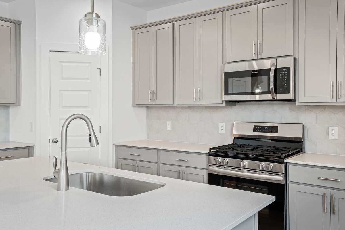 Picture of model home and not of actual home being built.  Colors and selections may vary