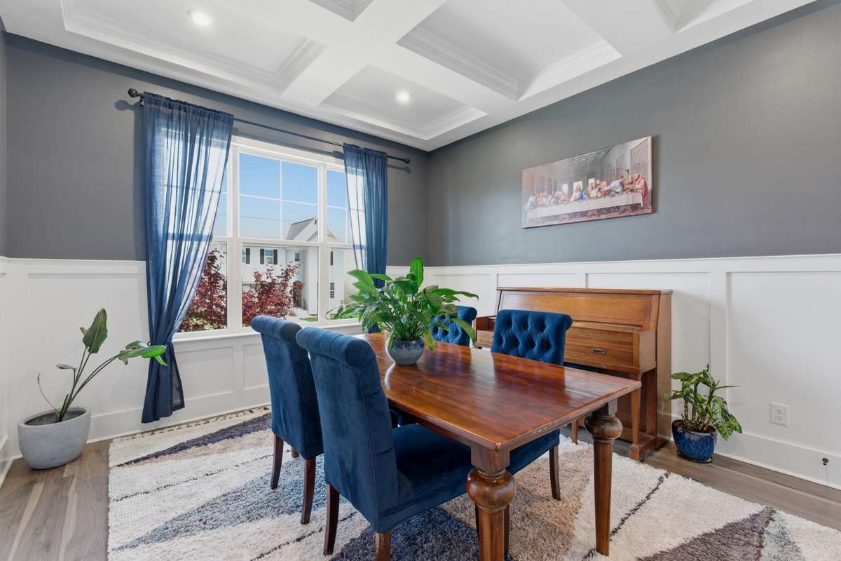 Just off the entry, you’ll find a dedicated home office that is currently being used as a formal dining room, perfectly positioned before the main living space.