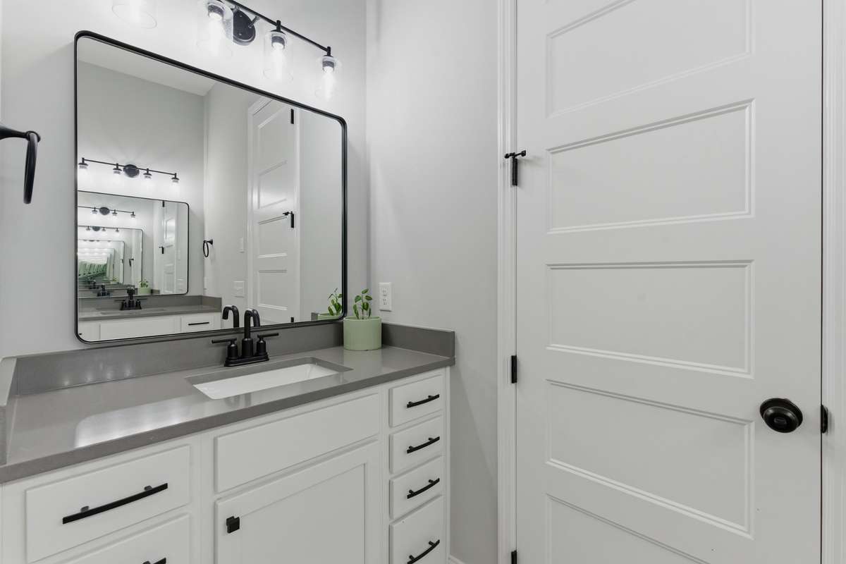 Dual vanity offers plenty of counter space and storage.