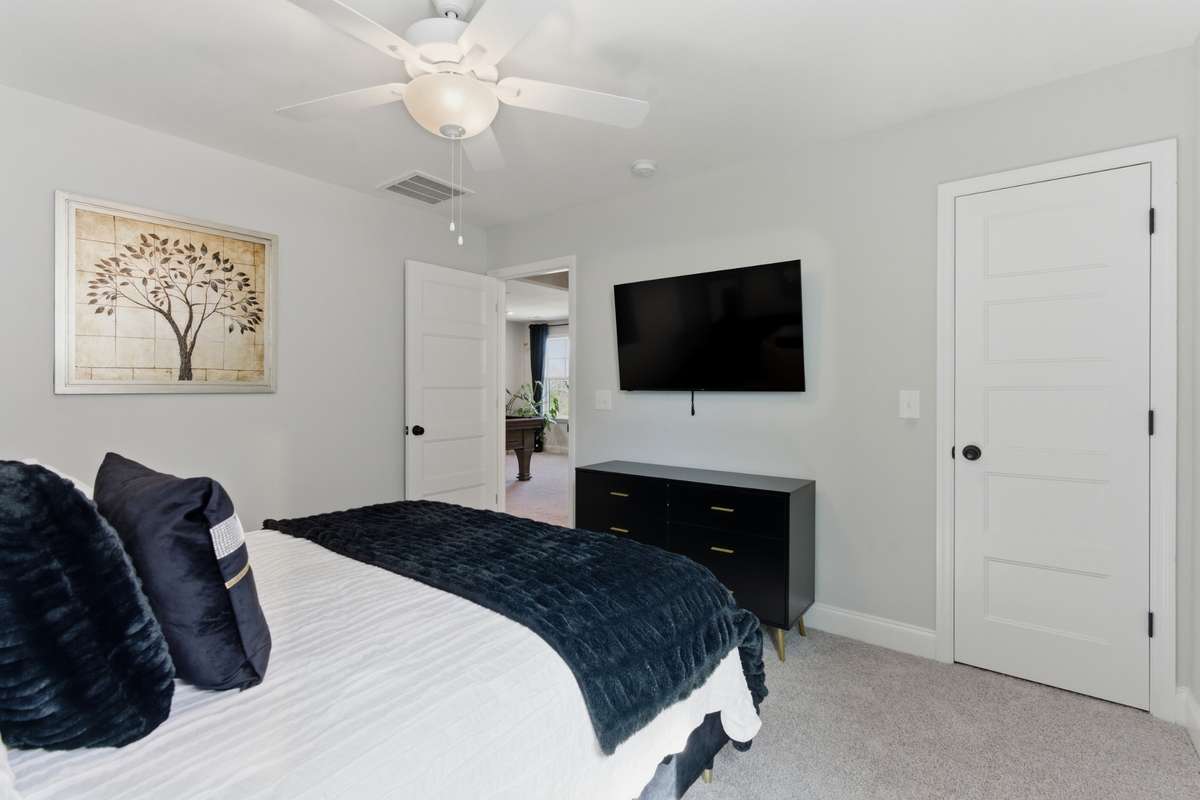 This bedroom feels private and tucked away, making it ideal for guests or a quiet retreat.