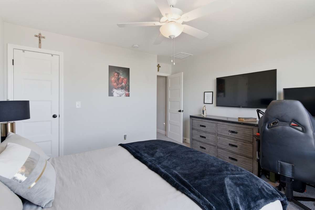 Bedroom 3 is ideal for guests, a home office, or growing households.