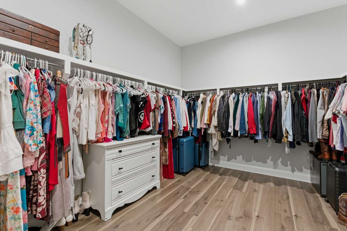 Expansive walk-in closet with room for full organization!