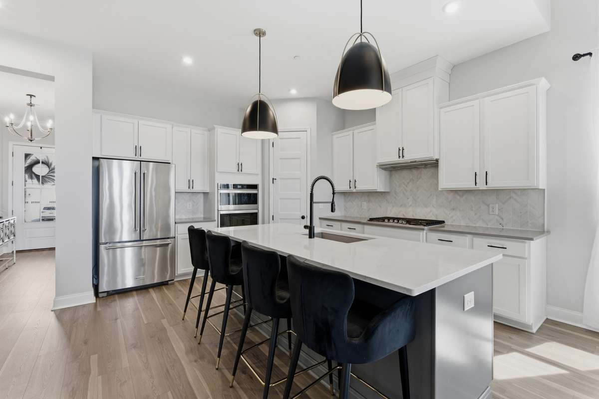 Oversized island with seating, perfect for casual meals or hosting.