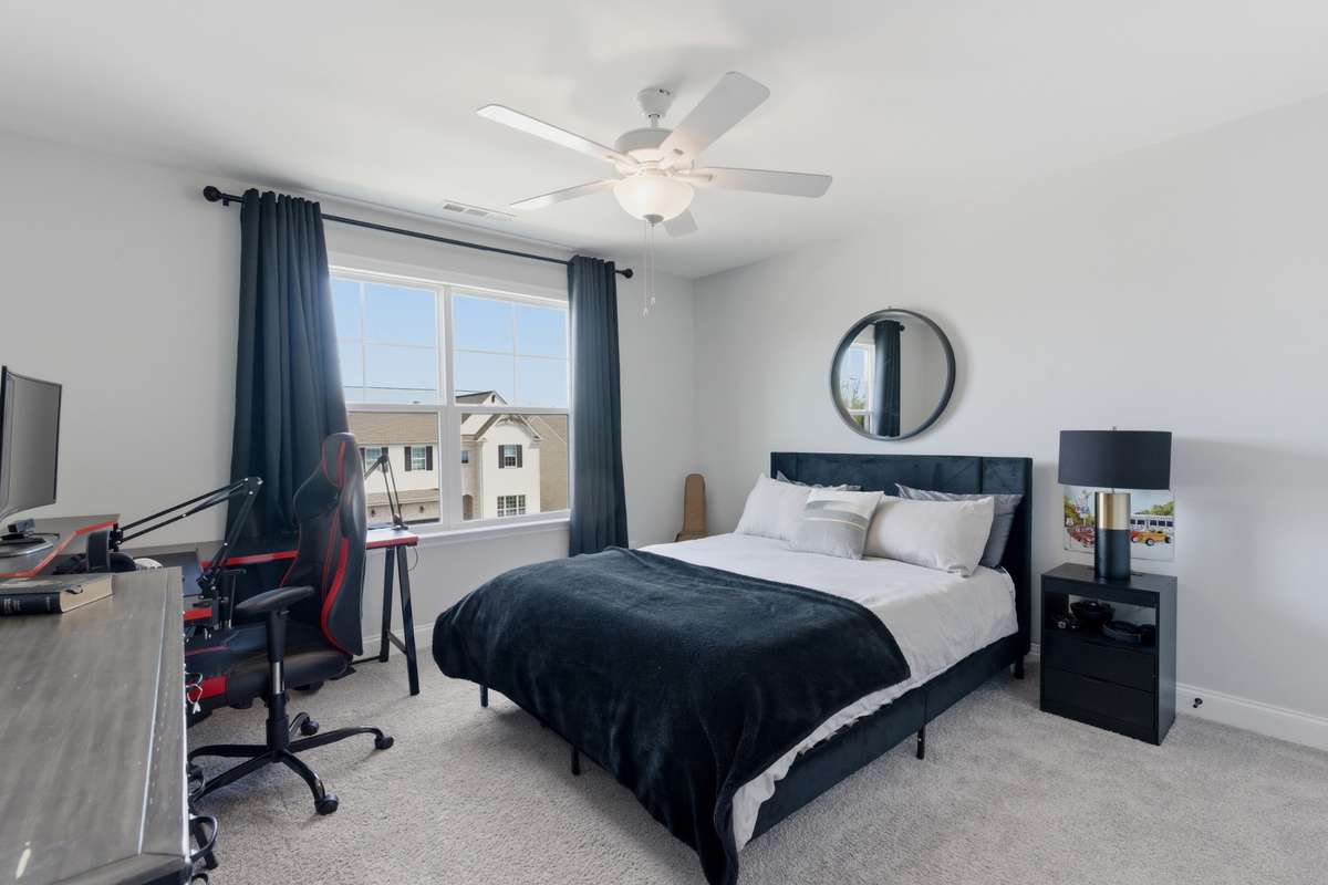 Bedroom 3 features a well-proportioned layout, ideal for a full bedroom setup.