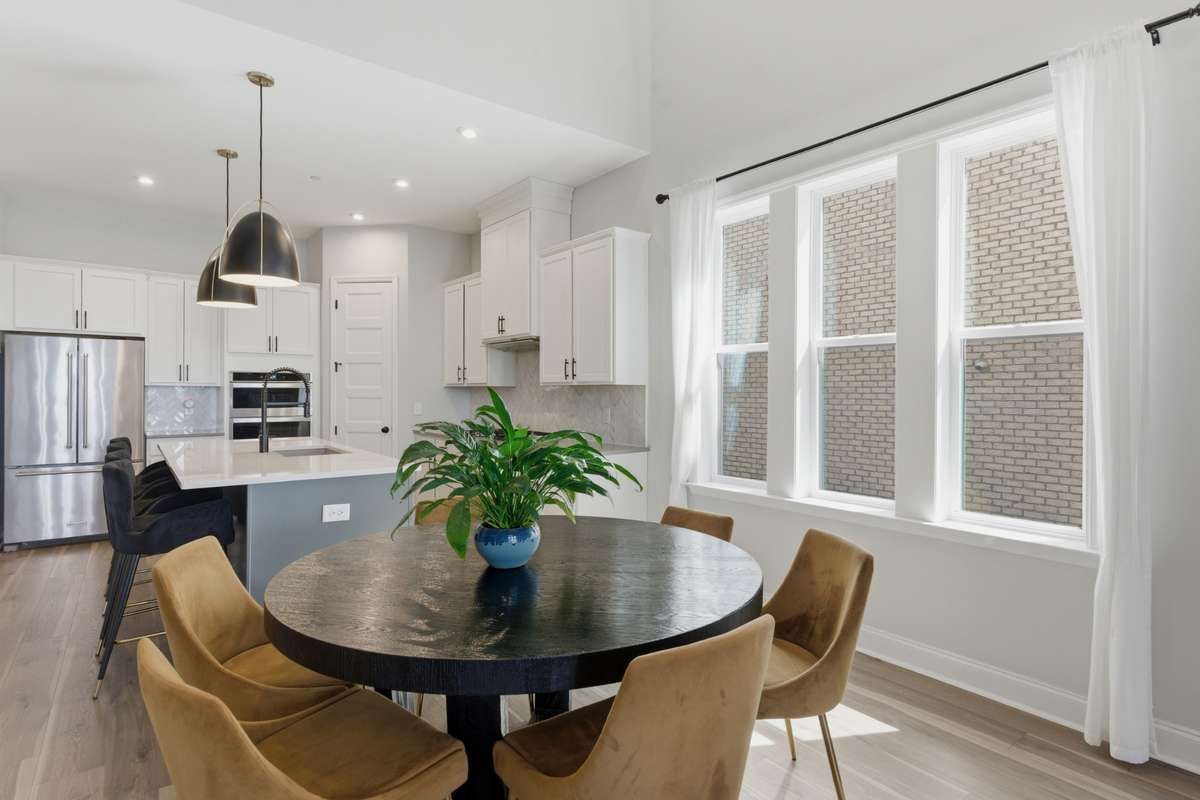 Continuing into the kitchen, you’ll notice how easily everything stays connected to the main living space.