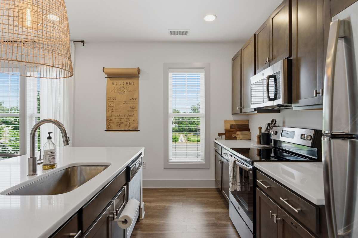 The elegant stainless steel appliances are easy to clean and maintain.