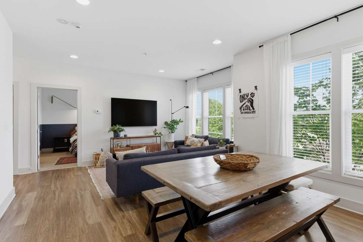 Luxury plank flooring flows throughout the main living areas.
