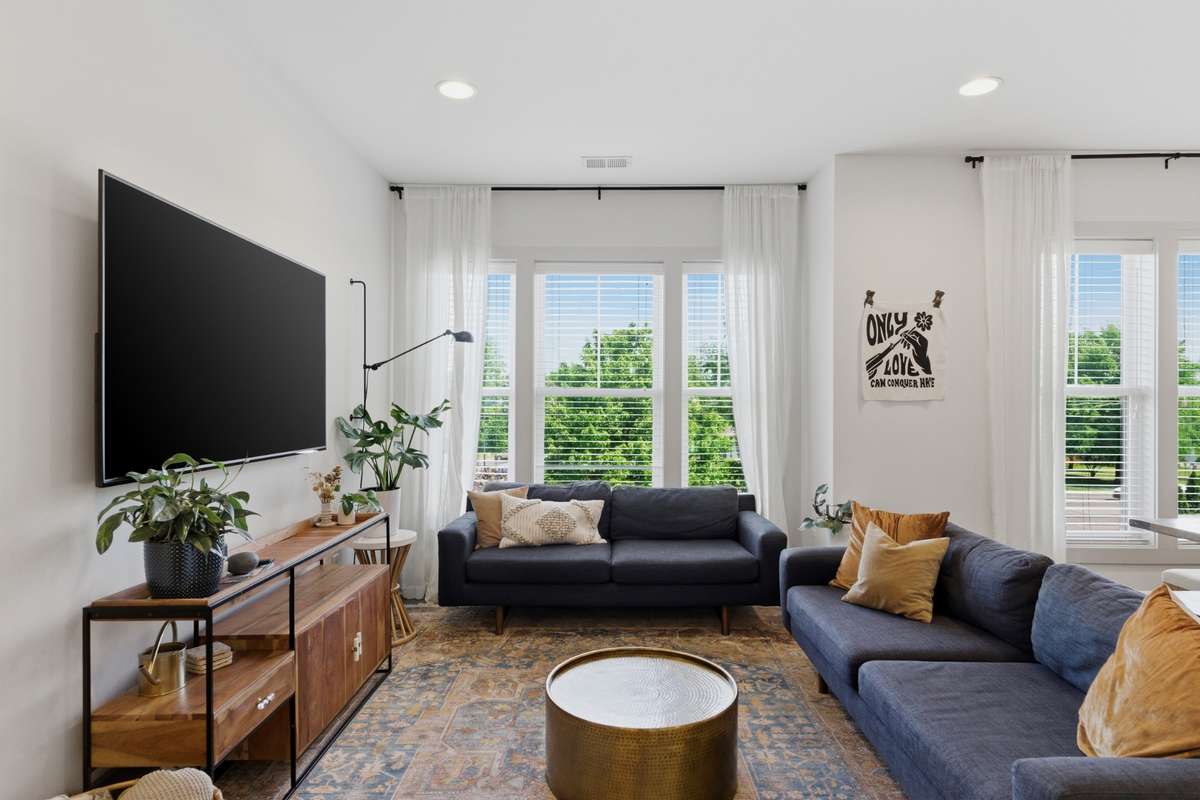 Tall windows fill the space with natural light!