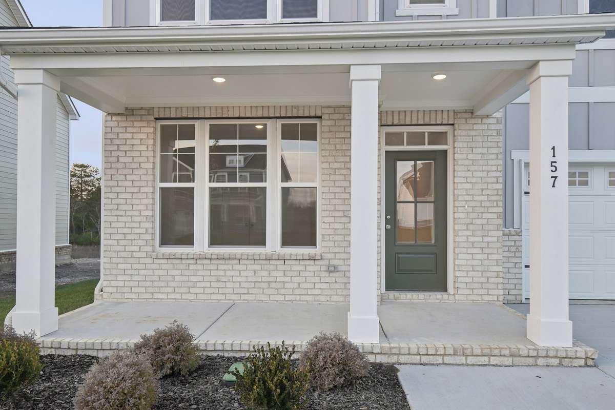 Enjoy your morning coffee on the covered front porch!