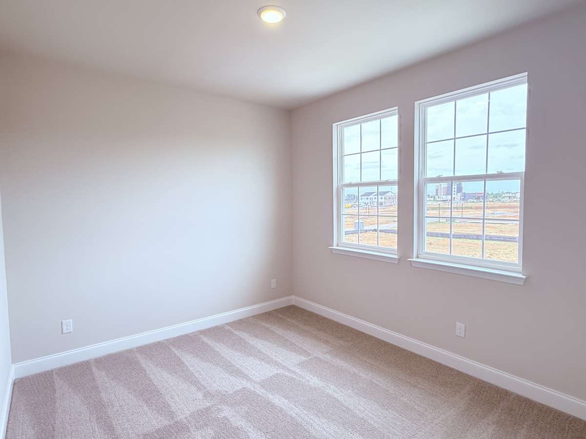 A well-sized 12' x 10' Bedroom 3 is situated on the second floor, perfect for family or guests.