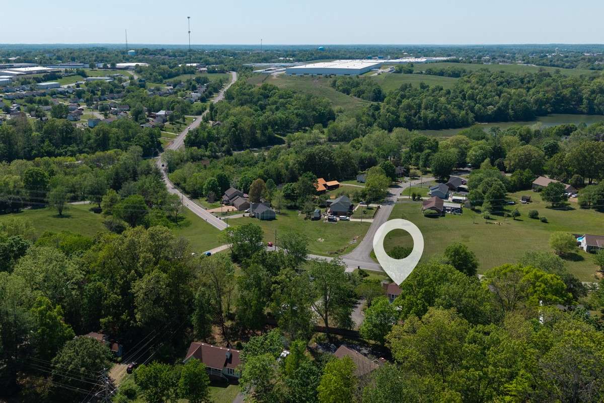 Look!  See the lake?  This location has room for the garden, privacy your desire and . . .