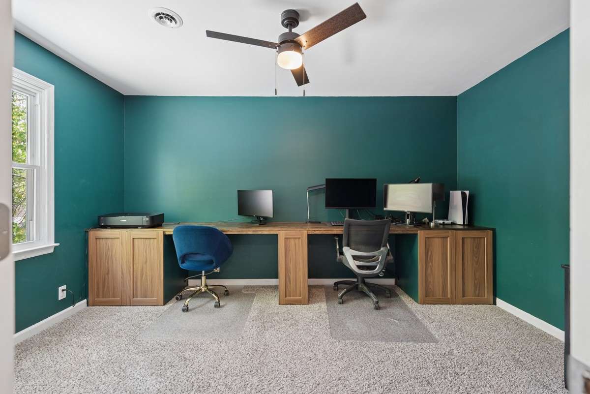 Guest Room 2 is being used for an office.  The built-in desk remains with the home.