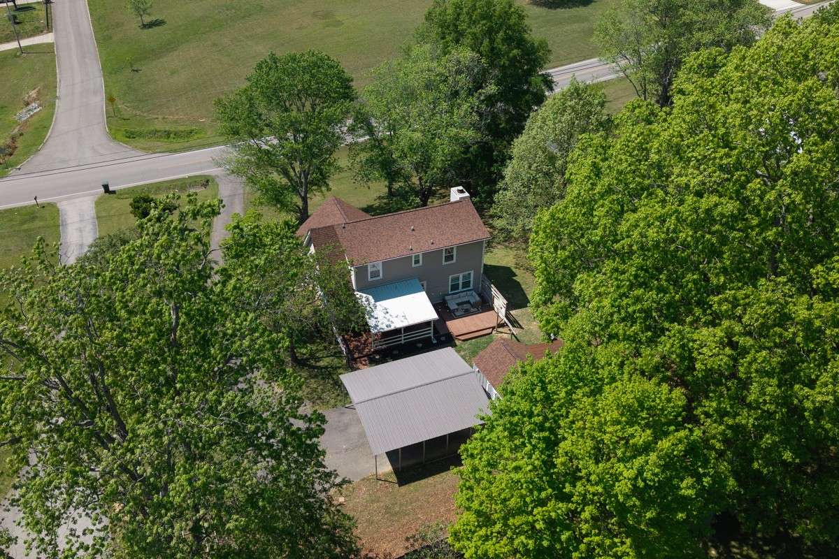 The mature trees give you the privacy you crave on this 1/2 acre lot.  For your furry friends, the backyard is fenced.