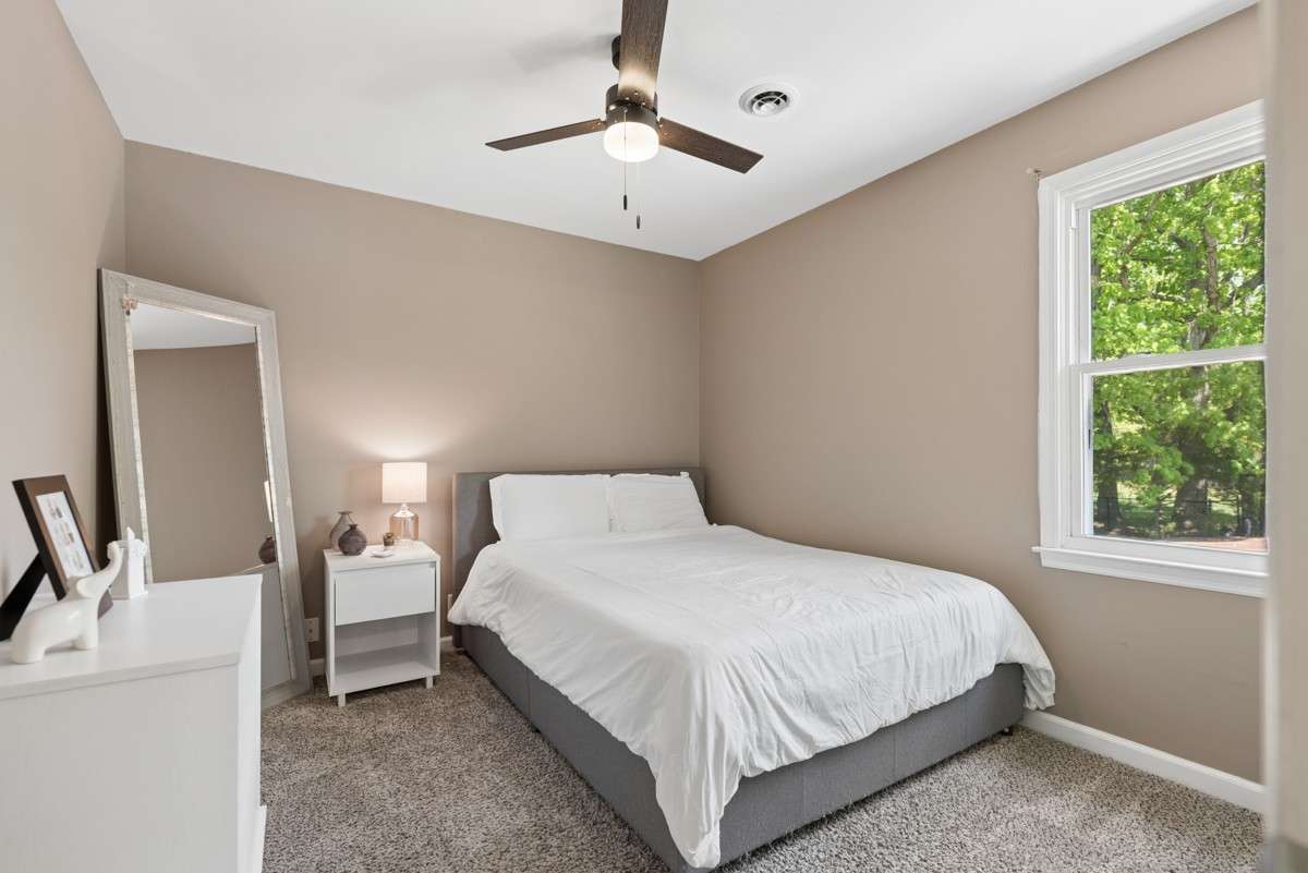 Guest room 1 overlooks the backyard and has great closet space.