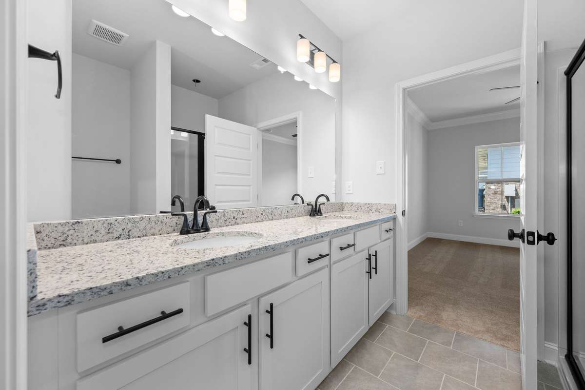 Pics are of previously completed home of same floorplan. Features and finishes may vary.