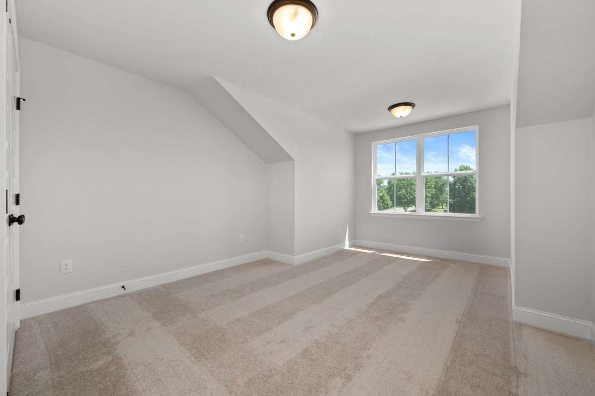 Pic is of previously completed home of same floorplan. Features and finishes may vary.