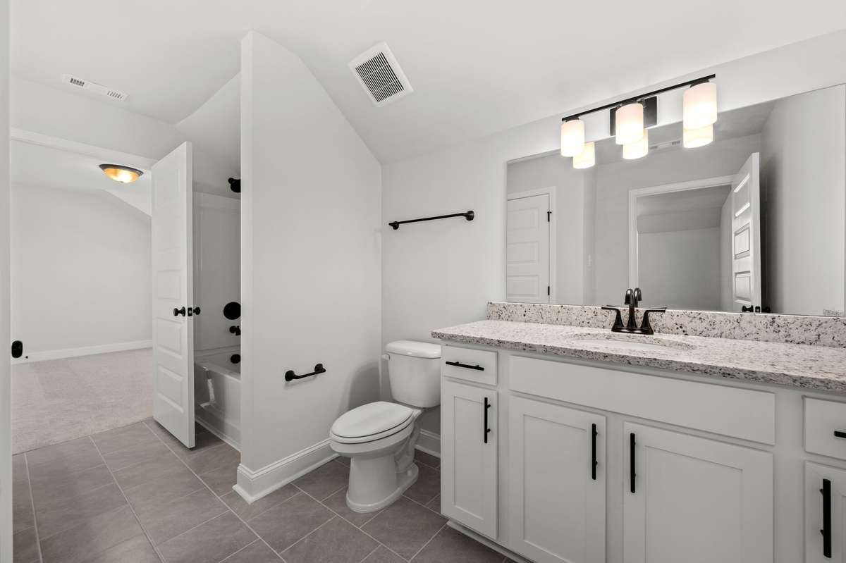 Pics are of previously completed home of same floorplan. Features and finishes may vary.