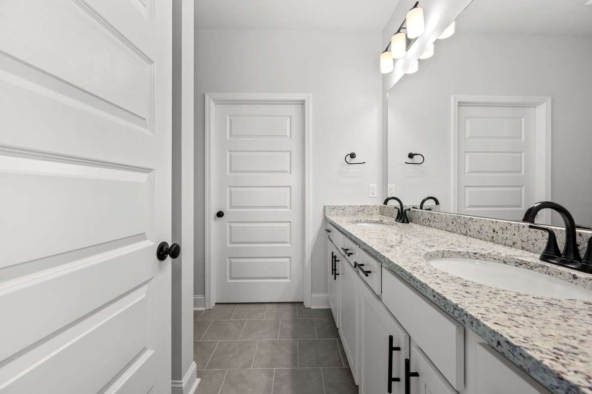Pics are of previously completed home of same floorplan. Features and finishes may vary.