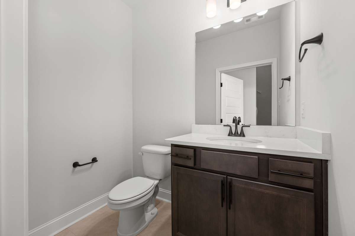 Photos shown are of a completed home of the same floorplan and are for reference purposes only. Options and colors may vary.