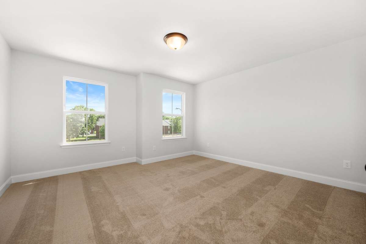Photos shown are of a completed home of the same floorplan and are for reference purposes only. Options and colors may vary.