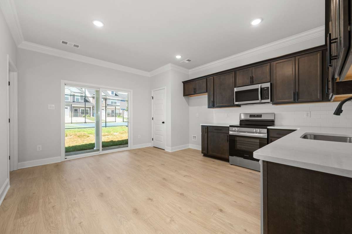 Photos shown are of a completed home of the same floorplan and are for reference purposes only. Options and colors may vary.