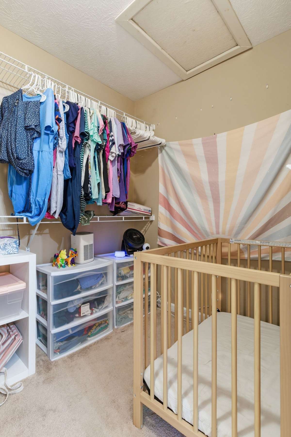 Spacious primary closet.