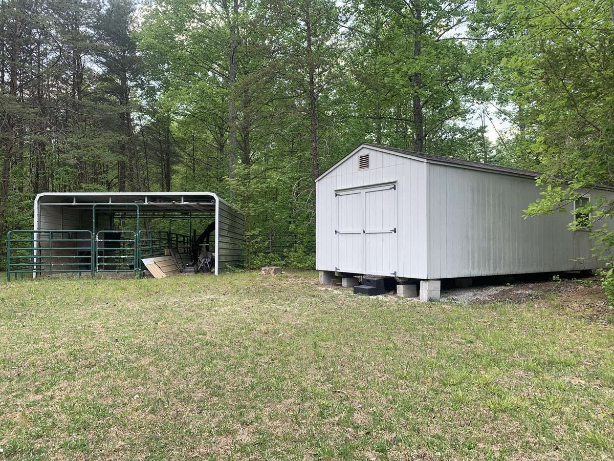 Horse stall and wired storage bldg.