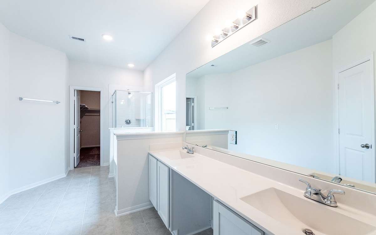 Picture are of a previously completed home and finishes will vary. This home includes 3 garage garage.