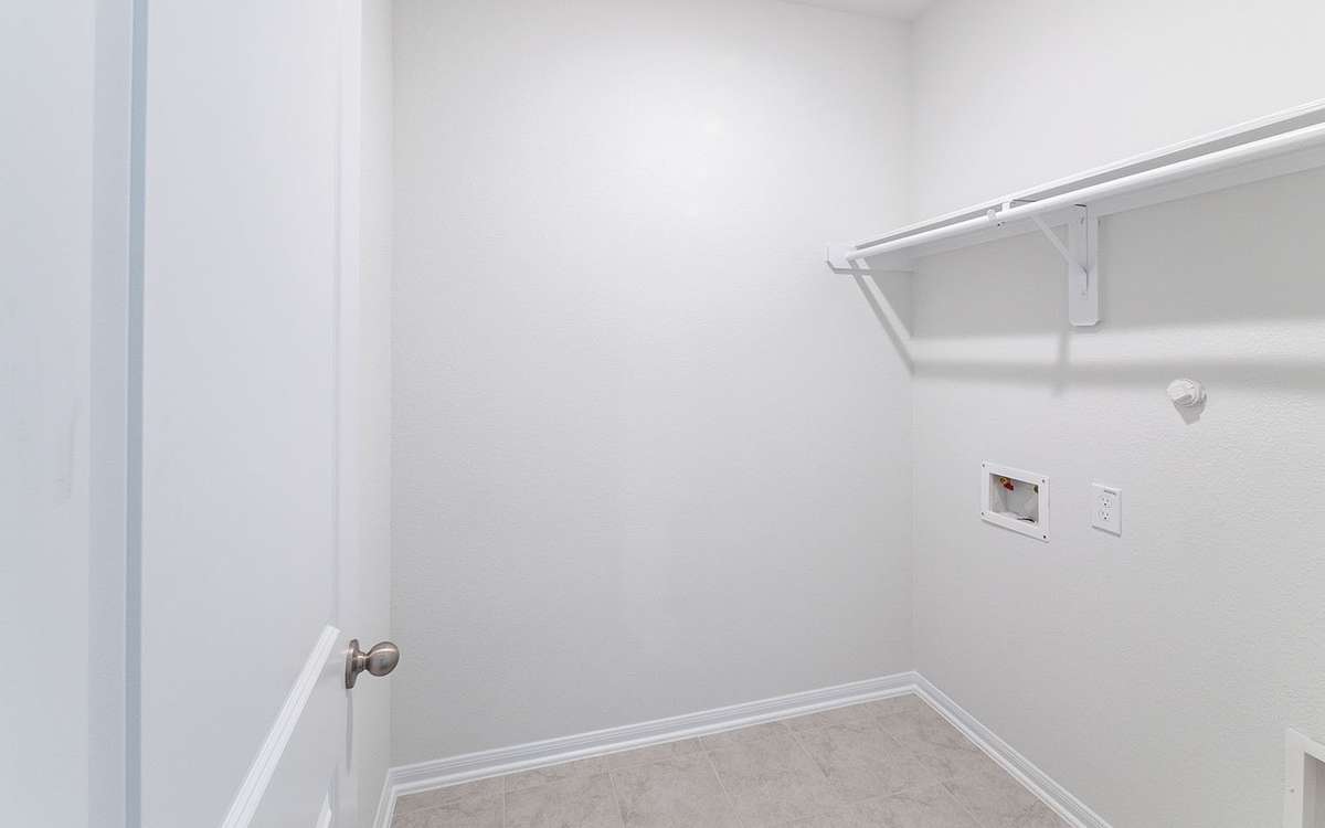 Picture are of a previously completed home and finishes will vary. This home includes 3 garage garage.