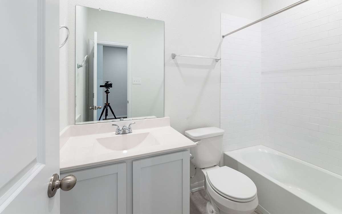 Picture are of a previously completed home and finishes will vary. This home includes 3 garage garage.