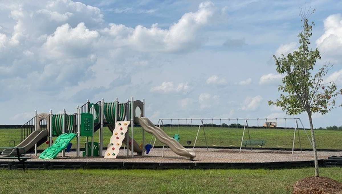 Playground photo is for illustrative purposes, Reserve at Hickory Ridge playground is under construction.