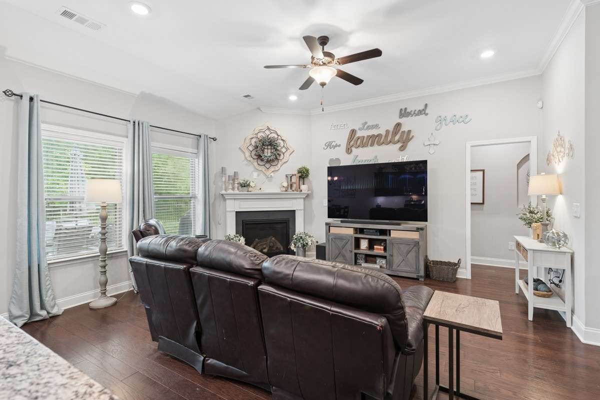 Tons of natural light in the living room, with windows that open to your private back yard