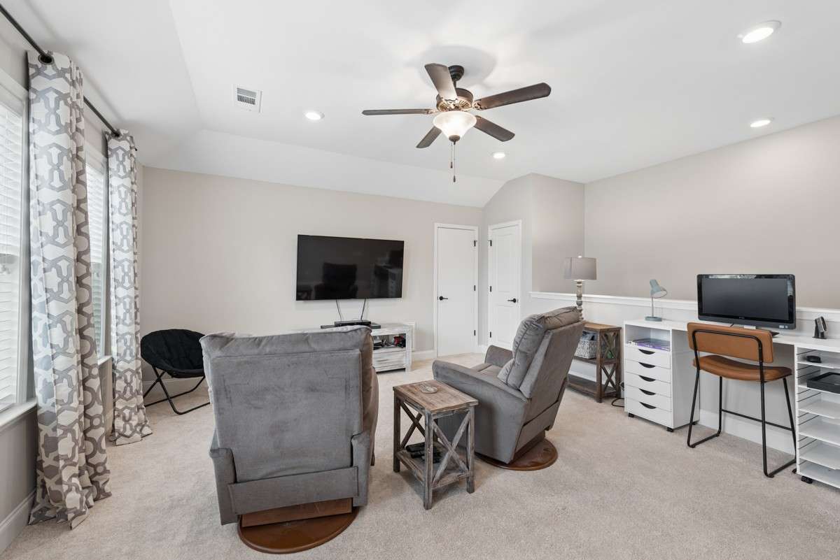The upstairs bonus room has all the space you need!
