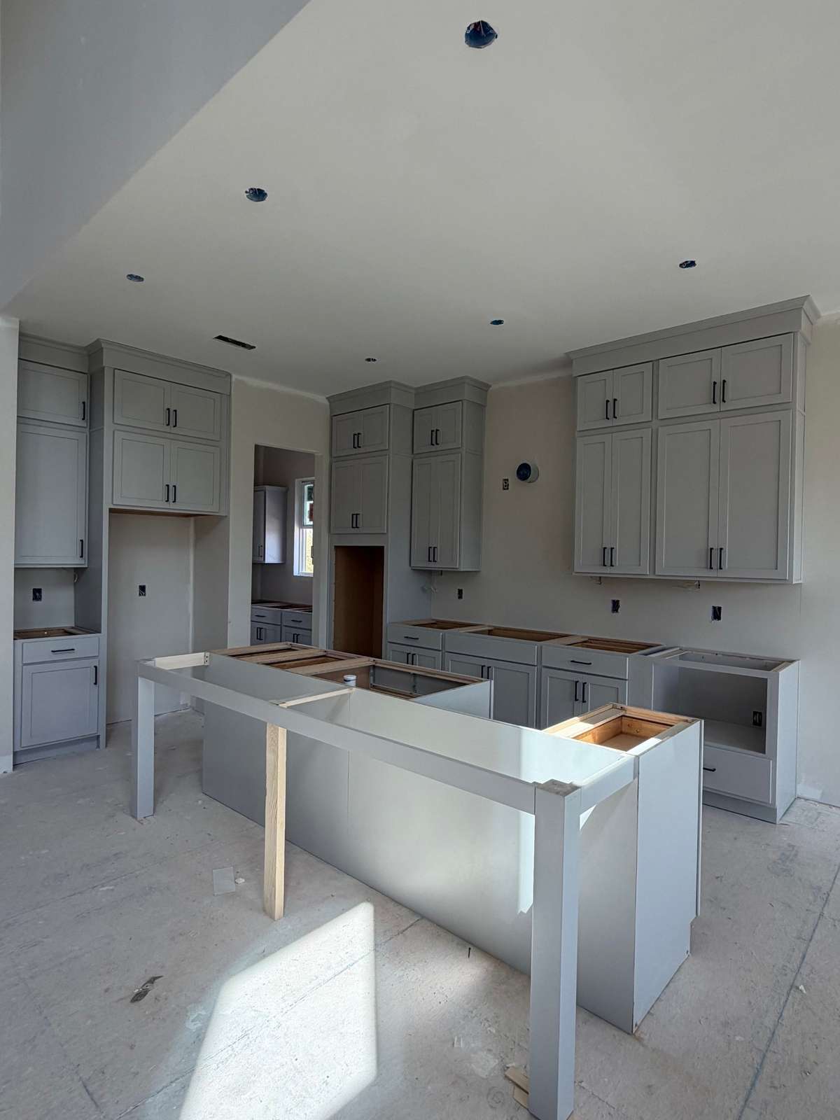 KITCHEN WILL HAVE WOOD VENTED HOOD