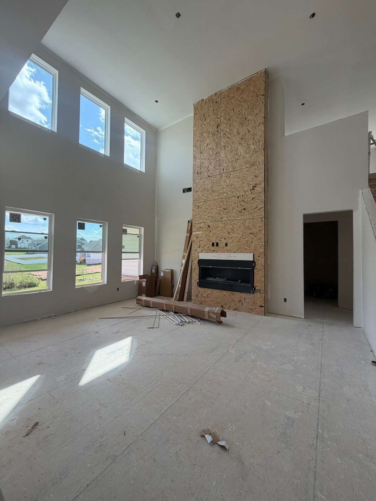 2 STORY GREAT ROOM WITH LARGE LINEAR GAS FIREPLACE