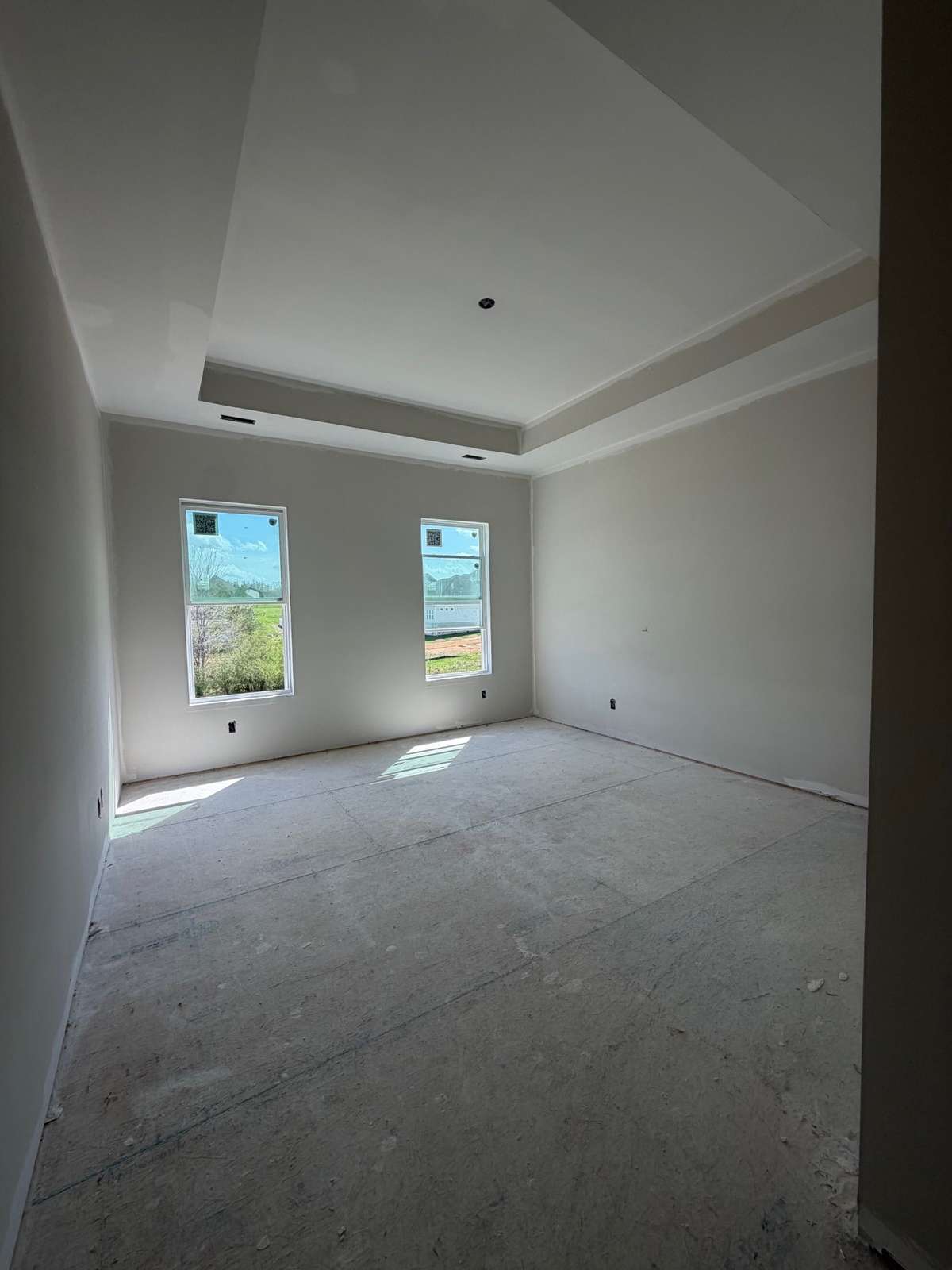 PRIMARY ON MAIN FLOOR HAS TRAY CEILING