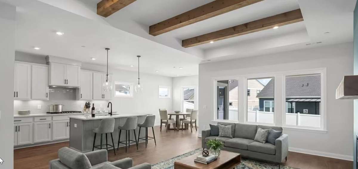 NOT ACTUAL HOME. Picture of same plan in another community. Home showing optional upgrades and features.