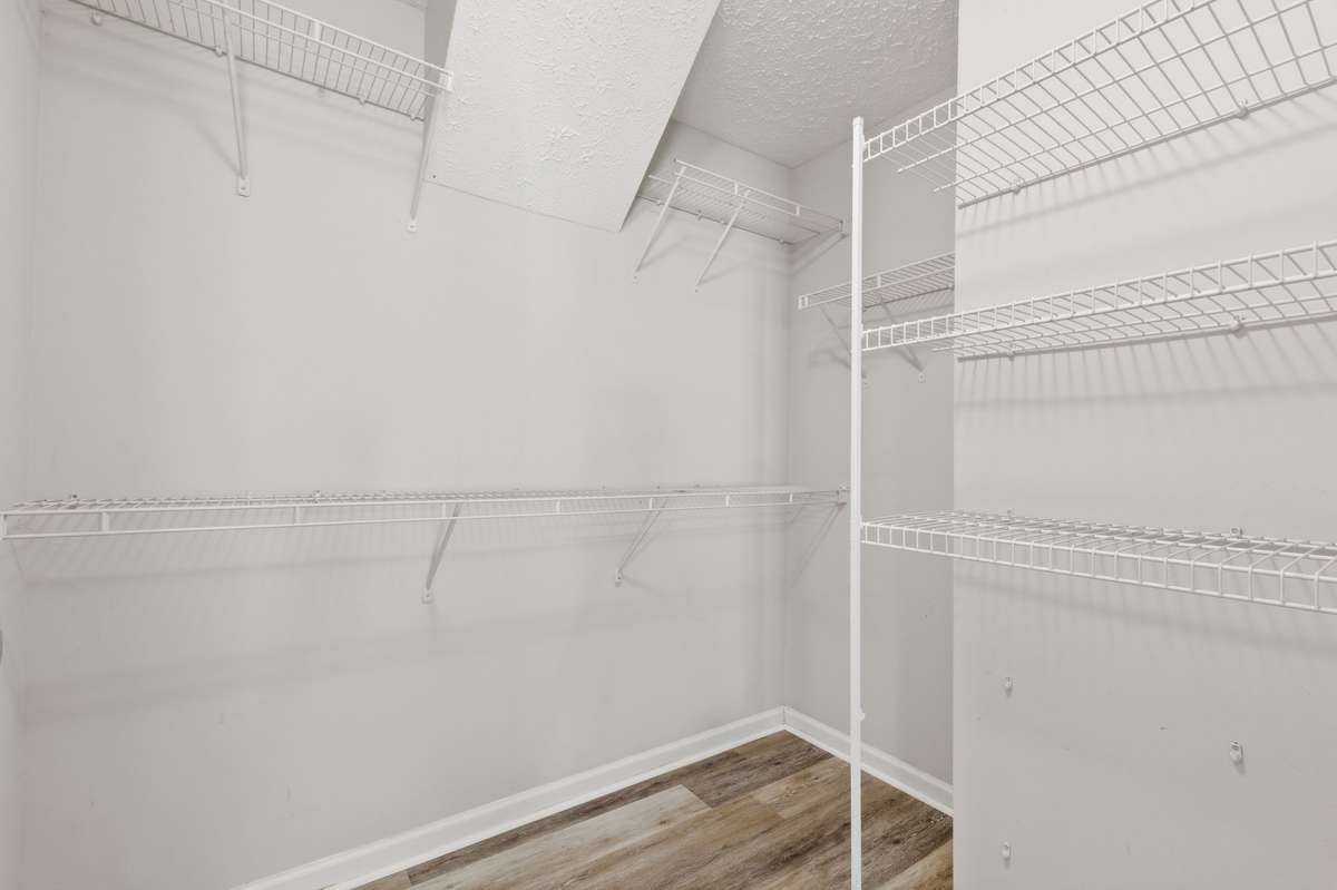 Oversized tub and shower combination with built-in shelving in the Master Bathroom.