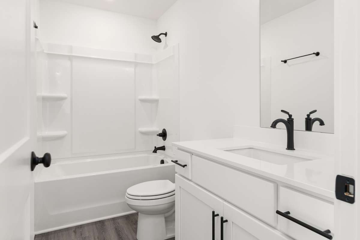 Photos of similar home! Model home available to tour, staged with furniture for visual reference!