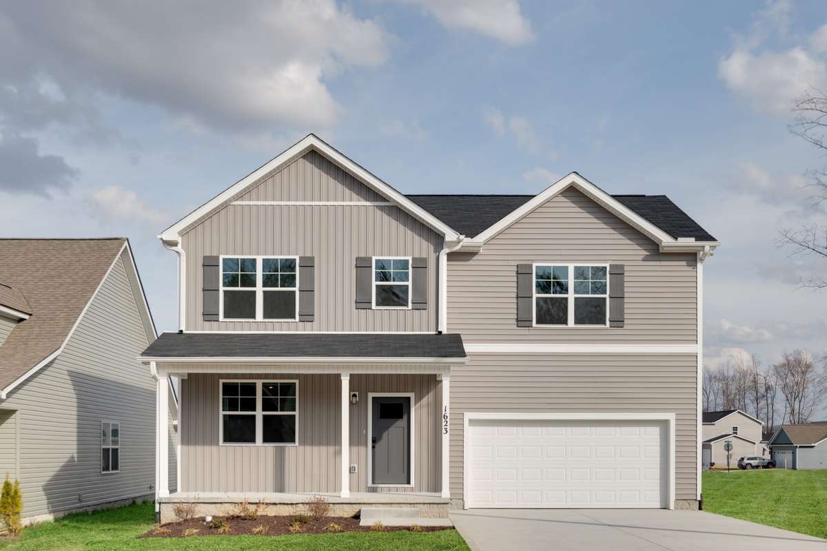 Photo of actual home!! Don't you LOVE that front porch!