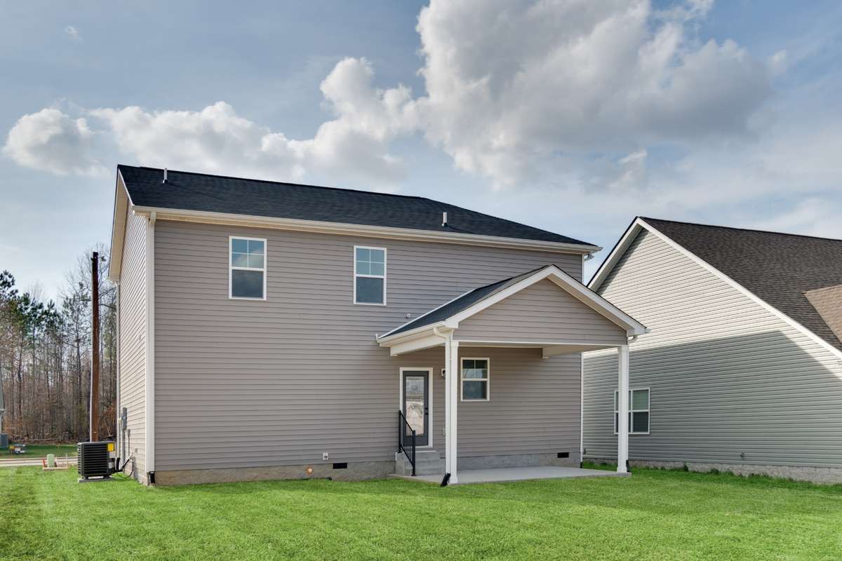 Can't you imagine yourself relaxing on this covered back patio!?